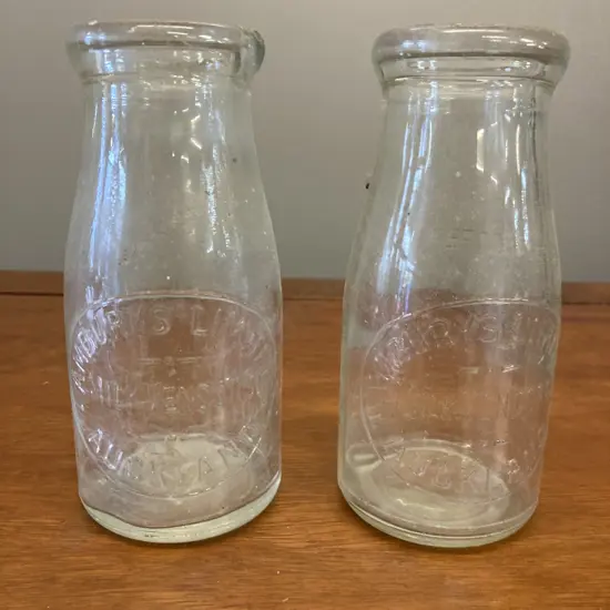 Ambury's Limited Milk Vendors Auckland 1/2 Imperial Pint Bottles, 1950s. H13cm